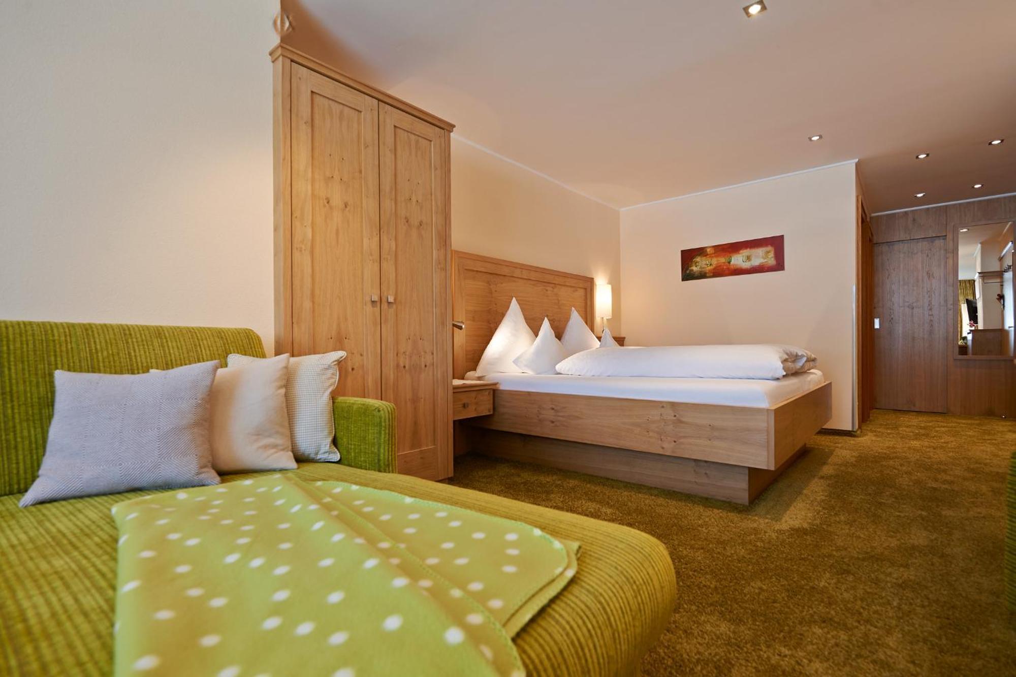 Hotel Restaurant Formarin Oberlech Pokoj fotografie